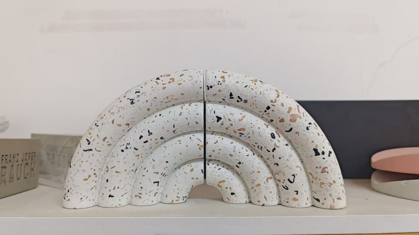 Terrazzo-patterned fan-shaped bookshelf